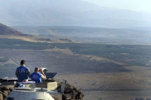 UN peacekeepers monitor the Syrian side of the border