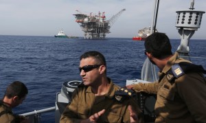 Captain Lavi speaks during an interview with Reuters aboard a patrol boat in the Mediterranean sea, west of Ashdod