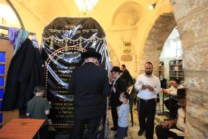 Jewish men pray in Rachel's Tomb