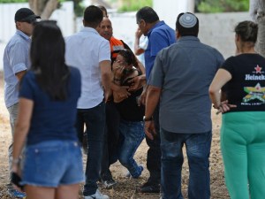 The aftermath of a rocket attack on Ashkeon, July 13, 2014 : GPO/Kobi Gideon