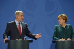 Israeli Prime Minister Benjamin Netanyahu holds a joint press conference with German chancellor Angela Merkel, in Berlin, Germany, on October 21, 2015. PM Netanyahu is on official state visit in Berlin. Photo by AMos Ben Gershom/GPO 